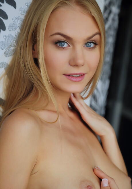 Hot ukrainian blond youthful Nancy A in sexy lingery baring her butt and spreading her legs 