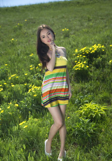 Slender asian dark-haired teen Li Moon in nice skirt likes foot fetish outdoor